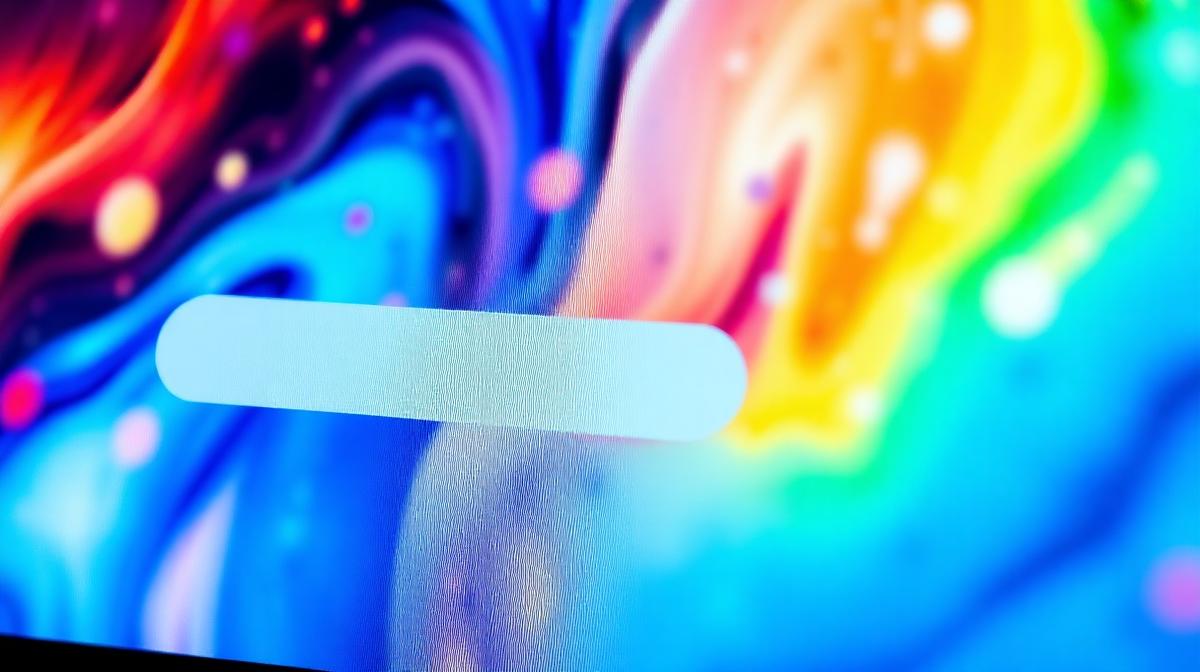 Laptop screen showing search engine results in a bright modern office